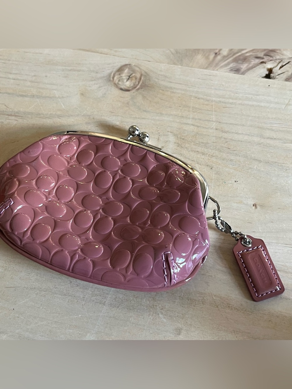 Coach mauve pink kisslock embossed signature C coin purse